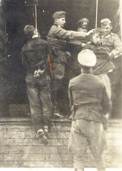 German soldiers hanging two Jews in the  Vilna ghetto.
